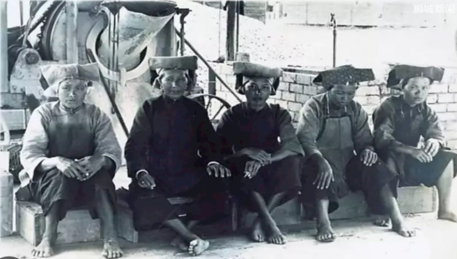 Samsui women wearing their red headscarves